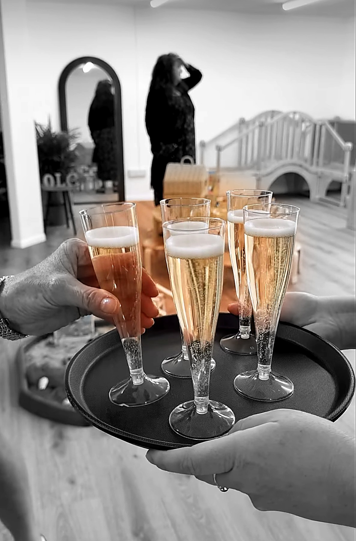 Champagne served on a tray at a Sip Sisters wedding